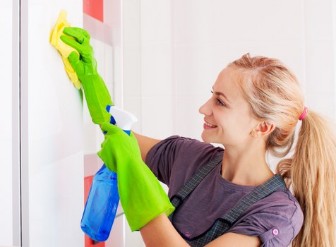 Cleaner applying safety measures during routine cleaning work