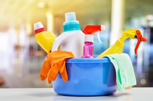 Professional cleaner preparing a Brompton property with careful attention to detail