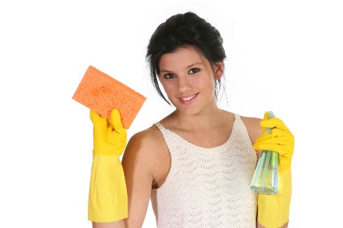 Cleaning expert handling detailed surface care in a Brompton property