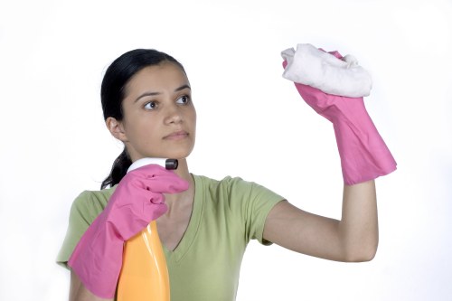 Office cleaner maintaining desks and shared spaces in Brompton